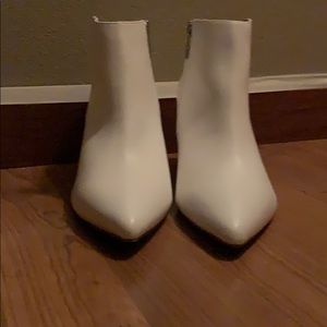 white high heeled boots